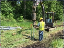 Construction Worker digging at site